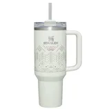 Stanley insulated travel mug with a handle, lid, straw, and geometric design.