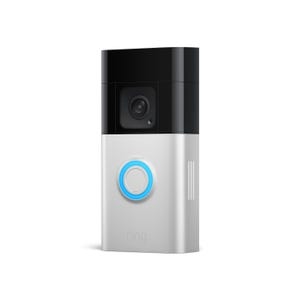 A Ring video doorbell, featuring a camera and a button with an illuminated ring, commonly used for home security and monitoring.