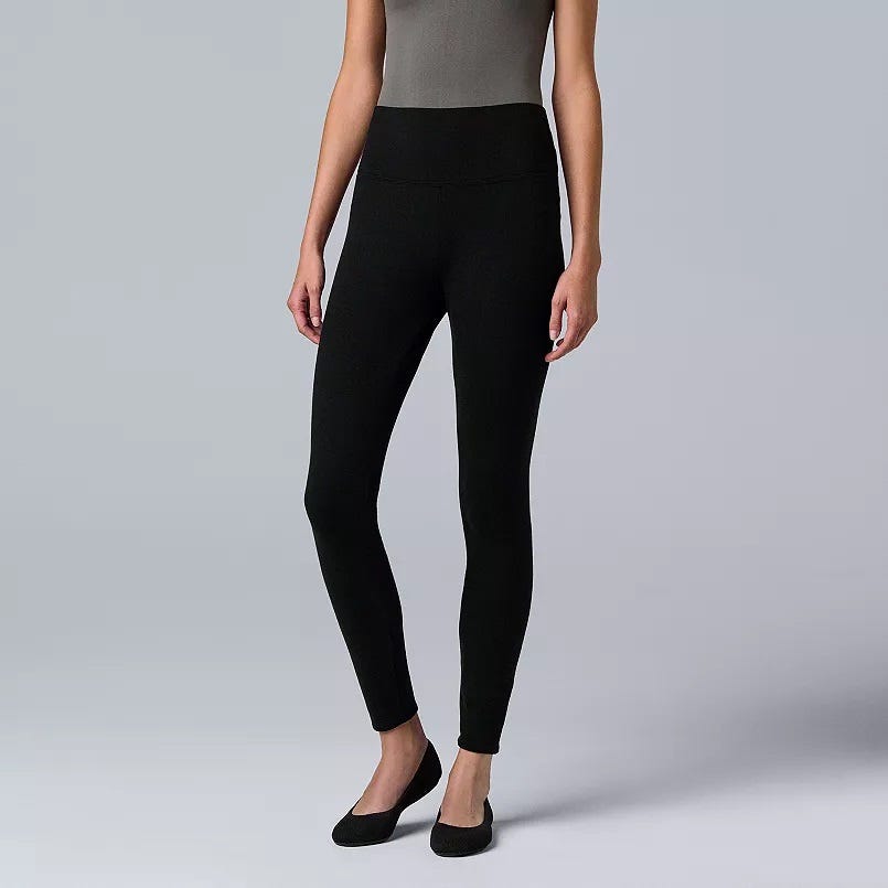 Black leggings and black ballet flats.