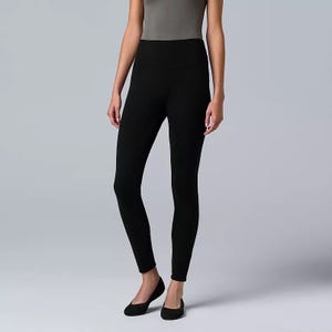 Black leggings and black ballet flats.