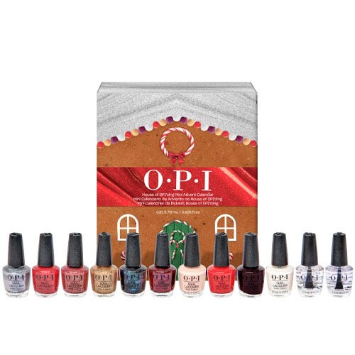 A collection of OPI nail polishes, featuring various colors in small bottles, paired with a gingerbread-themed advent calendar box.