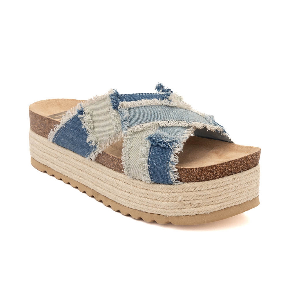 A single platform sandal with frayed denim straps and a braided jute midsole.
