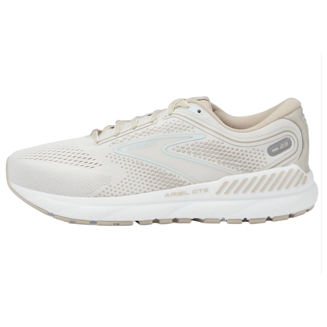 A single beige Brooks Ariel running shoe with breathable mesh and sturdy sole design.