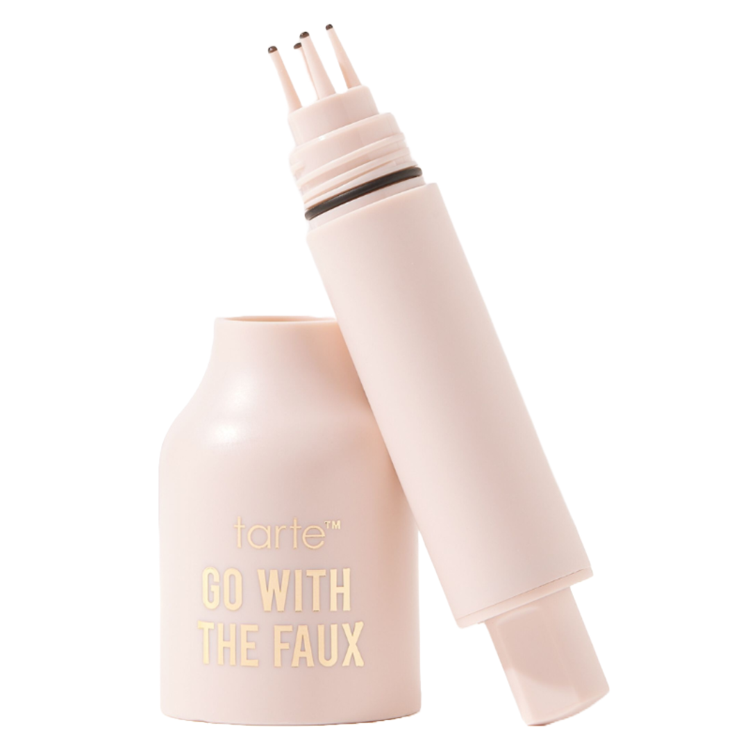 Tarte Cosmetics Go With The Faux Freckle Stamp is a light pink tube with a cap that contains a multi-pronged applicator designed to create natural-looking faux freckles on the skin.