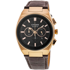 A Citizen Eco-Drive chronograph watch with a black dial, gold-tone case, and three subdials. It features a brown leather band, rose gold-tone hour markers, and luminescent hands.