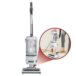 A Shark Lift-Away upright vacuum cleaner with a detachable canister for portable cleaning.
