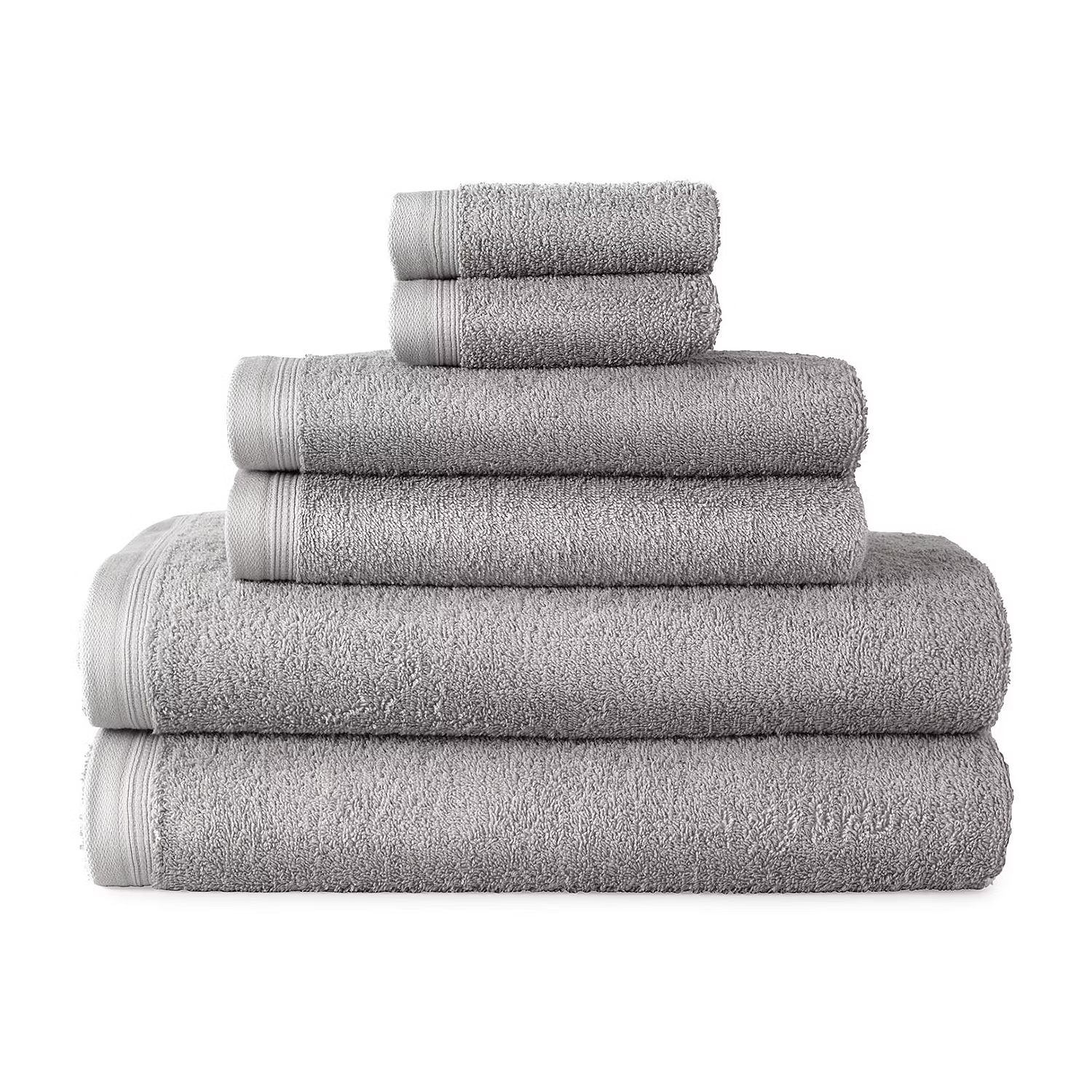 A stack of five gray towels in varying sizes, from washcloth to bath towel.