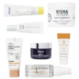 The image shows seven skincare products: Supergoop! sunscreen, Visha Skincare moisturizer, Patchology mask, Hanskin Glow Capsule Lotion, Prai night cream, BeautyStat Universal C Skin Refiner, and St. Moriz tanning mist.