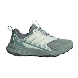A green Adidas Terrex trail running shoe with mesh upper for breathability, featuring the brand's signature three stripes and a rugged outsole for enhanced traction.