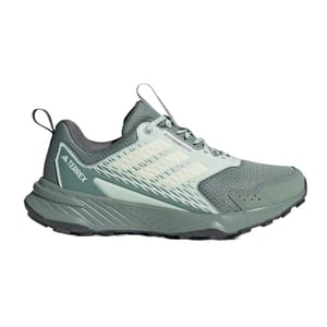A green Adidas Terrex trail running shoe with mesh upper for breathability, featuring the brand's signature three stripes and a rugged outsole for enhanced traction.