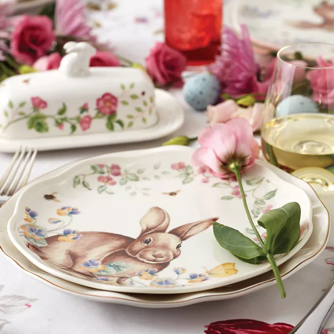 Set of 4 Lenox Bunny Accent Plates featuring a whimsical bunny design surrounded by colorful flowers and greenery on a white background, perfect for a spring table setting.