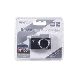 Vivitar Retro Keychain Camera with a 14MP sensor, full HD capability, and built-in memory for up to 100 photos. It features a color preview screen and comes in compact packaging, ideal for attaching to a keychain.