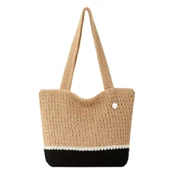 A crochet tote bag with dual-tone design featuring a beige upper section, a black bottom band, and a slim white stripe between them.