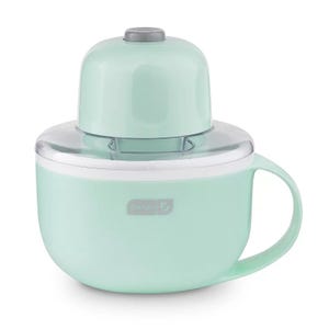 A compact electric ice cream maker with a mint green color, featuring a transparent lid and a handle for easy portability.