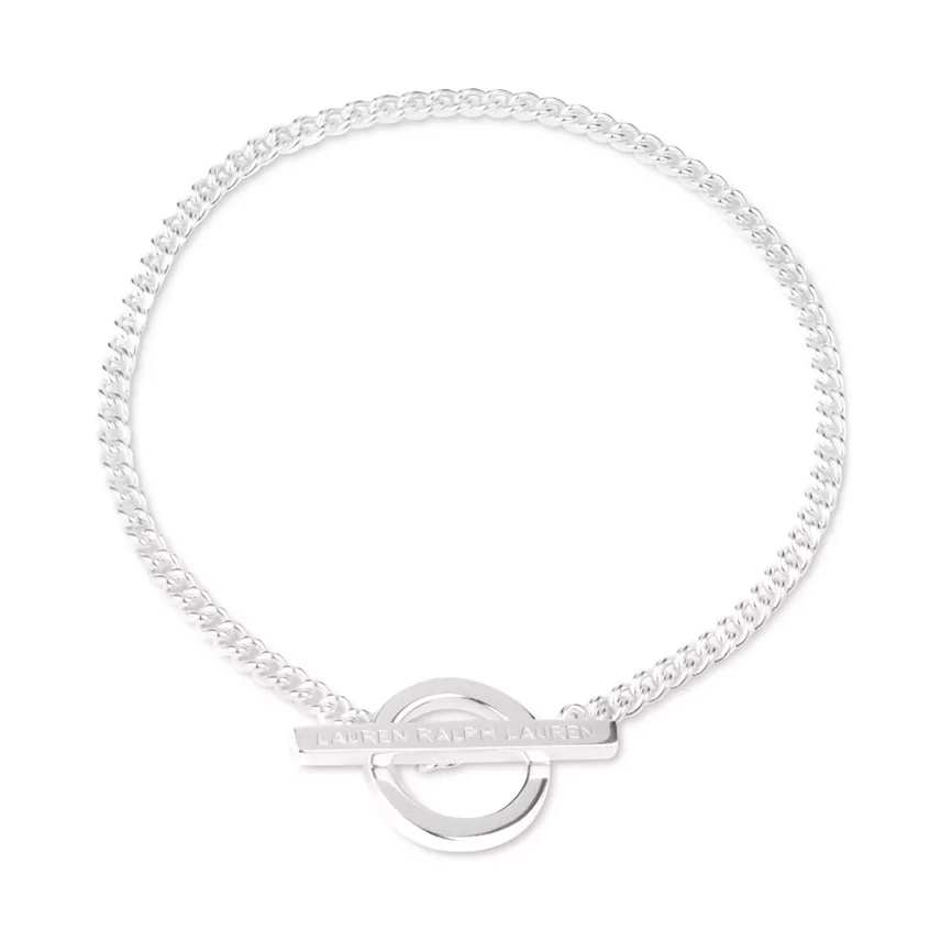 Silver bracelet with a braided design and a circular charm featuring the etched words \“Ralph Lauren.\“