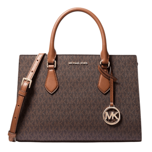 A Michael Kors brown handbag with the \“MK\“ logo pattern and gold-tone hardware, featuring dual handles and a detachable shoulder strap.