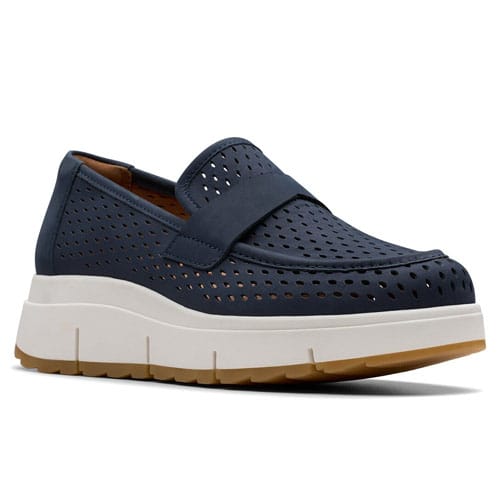 A navy blue slip-on loafer featuring a perforated design with a thick, white platform sole and brown tread.