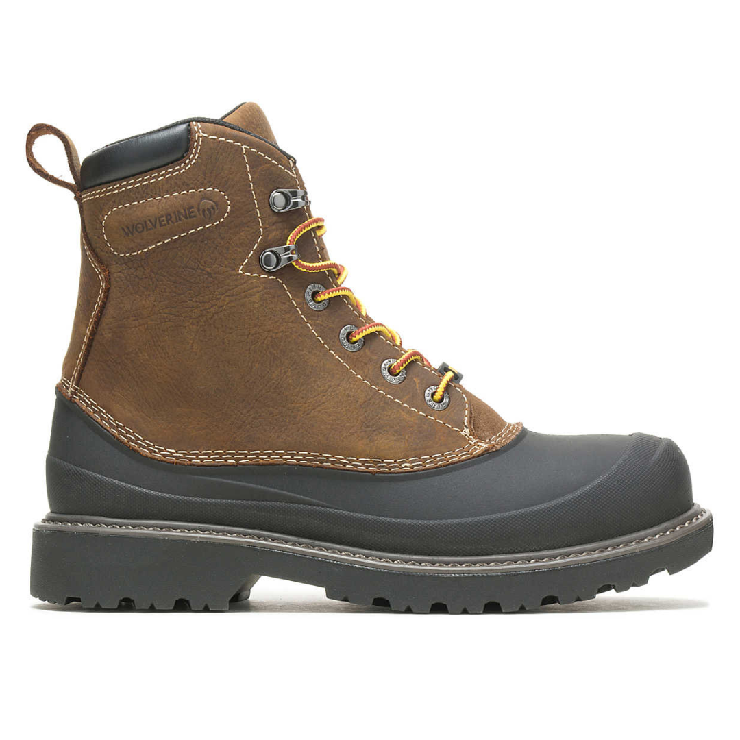 Brown Wolverine Steel Toe Work Boots feature a leather upper, rubber sole with deep treads, lace-up front with metal eyelets and red-yellow laces, reinforced rubber toe, and durable stitching for rugged work environments.