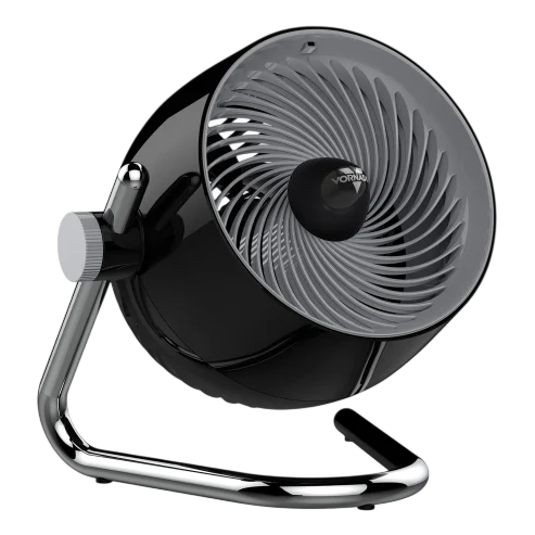 A compact, modern black table fan with a chrome stand and adjustable angle. The design features a spiral grill and a control knob for speed adjustments.