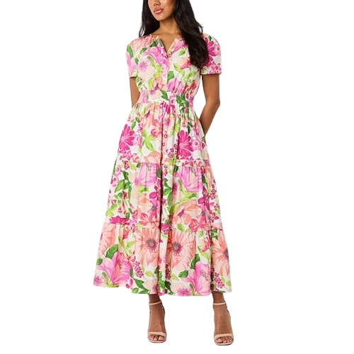 Short sleeve floral maxi dress featuring pink and green hues, a button front, V-neckline, and a tiered skirt, paired with nude heels.