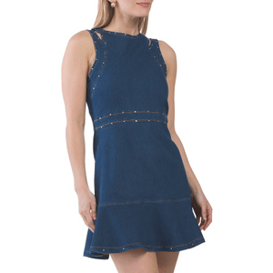 Sleeveless denim dress with a fitted bodice and a flounce skirt, featuring subtle stud embellishments along the seams.
