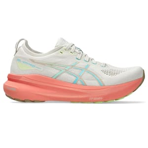 ASICS Gel-Kayano running shoe in white with blue accents and a prominent salmon-colored sole.
