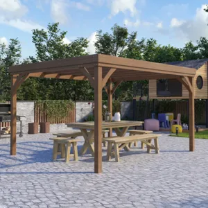 A wooden outdoor pergola with a picnic table and benches underneath, set on a stone patio. A grill is on the left, and there's a children's play area with colorful chairs in the background.