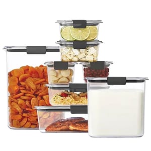Eight clear Rubbermaid containers with black lids in various sizes, including two large rectangular, three medium square, one medium rectangle, and two small square containers, designed for food storage.