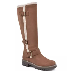 Tall beige suede boots with a plush lining, featuring two adjustable buckle straps and a chunky treaded sole.