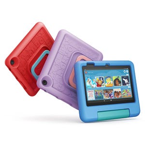 Three Fire Kids Tablets in red, purple, and blue colors with protective bumpers and rear stands, designed for children. The screen displays a child-friendly interface featuring educational and entertainment content.