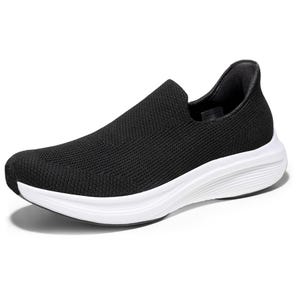 Black slip-on shoes with a sleek, knit upper and a cushioned white sole, designed for comfort and ease of wear.