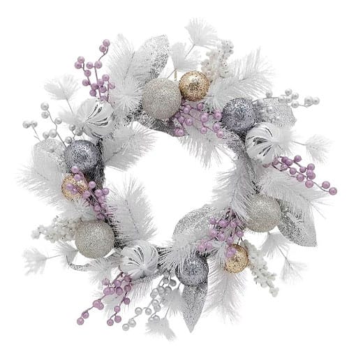 A decorative wreath featuring white feathers, silver and gold glittery ornaments, and clusters of purple and white berries.