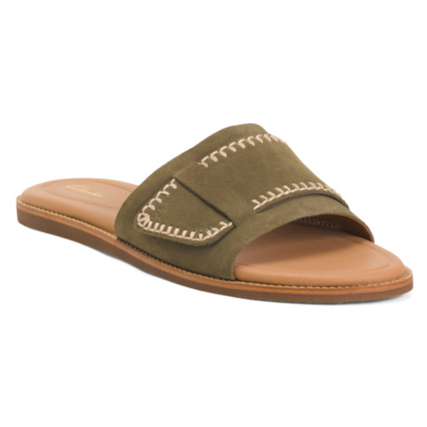 A slide sandal featuring an olive green suede strap with white stitching detail and a tan sole, offering a casual and stylish look.