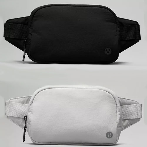 Two waist packs, one in black and the other in white, both with the brand's logo on the lower right corner.