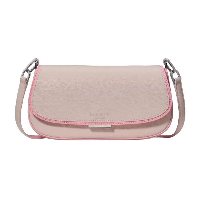 A light pink Kate Spade shoulder bag with a darker pink trim and a silver metal buckle. The bag features a pebbled leather texture and has a removable strap with silver-tone hardware.