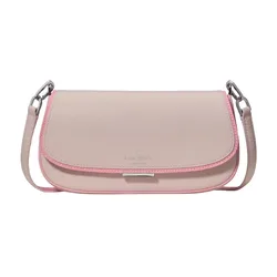 A light pink Kate Spade shoulder bag with a darker pink trim and a silver metal buckle. The bag features a pebbled leather texture and has a removable strap with silver-tone hardware.