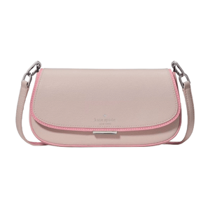 A light pink Kate Spade shoulder bag with a darker pink trim and a silver metal buckle. The bag features a pebbled leather texture and has a removable strap with silver-tone hardware.