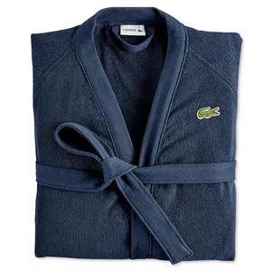 Navy blue robe with Lacoste branding, featuring a textured fabric and a tied belt closure.