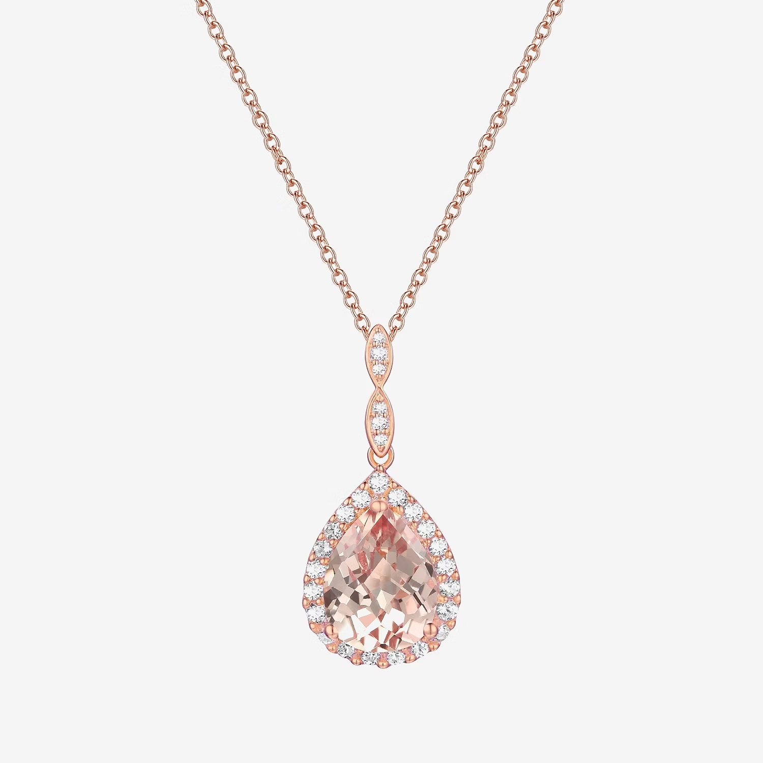 A rose gold necklace with a chain linking to a pear-shaped pendant encrusted with diamonds.