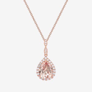 A rose gold necklace with a chain linking to a pear-shaped pendant encrusted with diamonds.