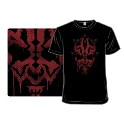 Black T-shirt featuring a bold red and black, ink-blot style graphic of a horned face with dripping effects.