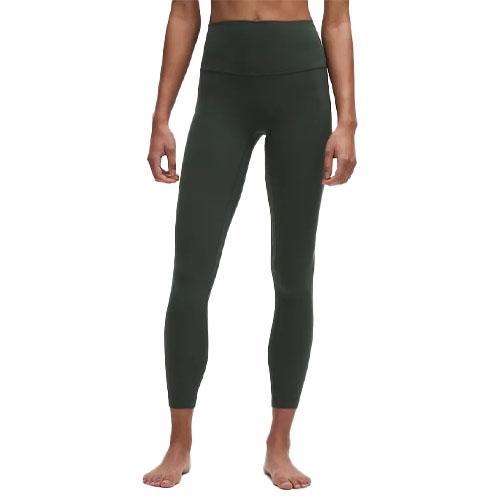 Dark green high-waisted leggings worn by a model, showcasing a form-fitting design.