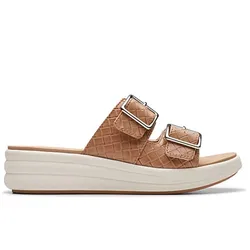 Tan platform sandals with two buckle straps and a woven texture on the upper, featuring a white layered sole for added height.