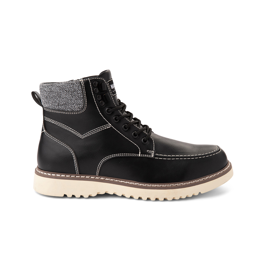 Black lace-up boot with tweed detailing at the top and a contrasting tan sole.