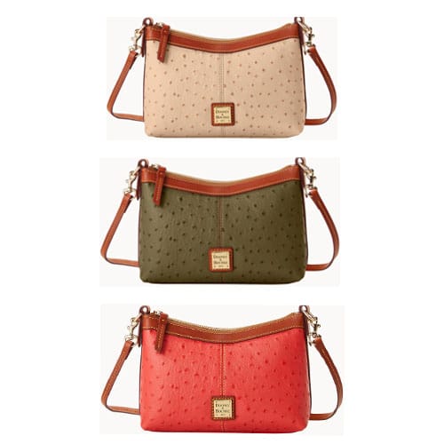 Three crossbody bags in pink, olive green, and red with perforated designs and tan leather trims.