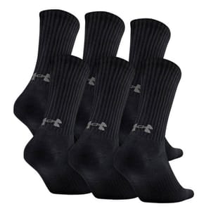 Six pairs of black Under Armour crew socks with ribbed detailing and the brand's logo on the ankle area.