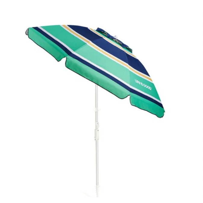 A 7-foot tilting beach umbrella with a blue, green, and yellow striped canopy on a white adjustable pole, featuring the text \“Life is Good\“ printed on one panel.