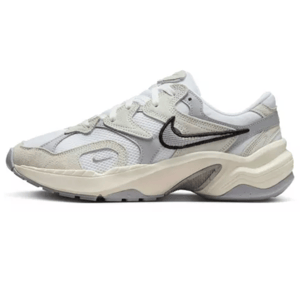 Nike Women's AL8 Shoes in beige and white feature a layered design with a sleek black swoosh, chunky midsole, and textured suede accents for a modern, comfortable look.