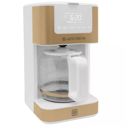 A white and gold West Bend drip coffee maker with a clear glass carafe, digital clock, and control panel.