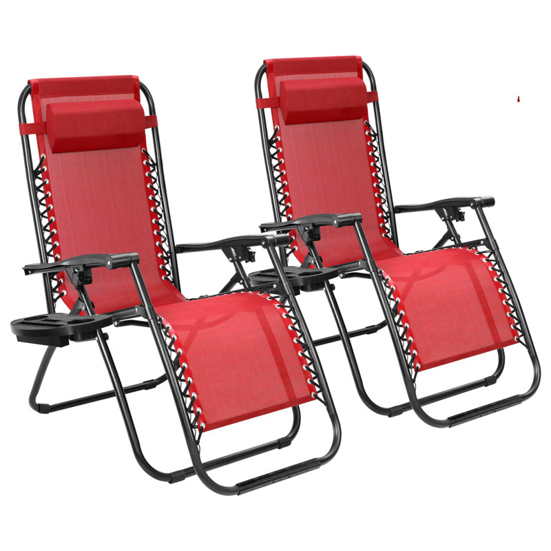 Set of 2 red zero-gravity lounge chairs with black frames, featuring adjustable reclining positions, headrest pillows, and attachable side tables.